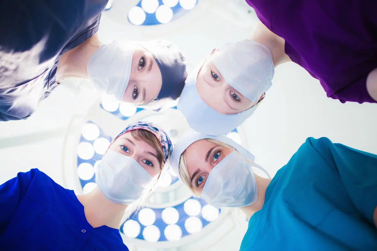 health care health bottom view four surgeons operation concept organ transplantation teamwork save lives belov shot